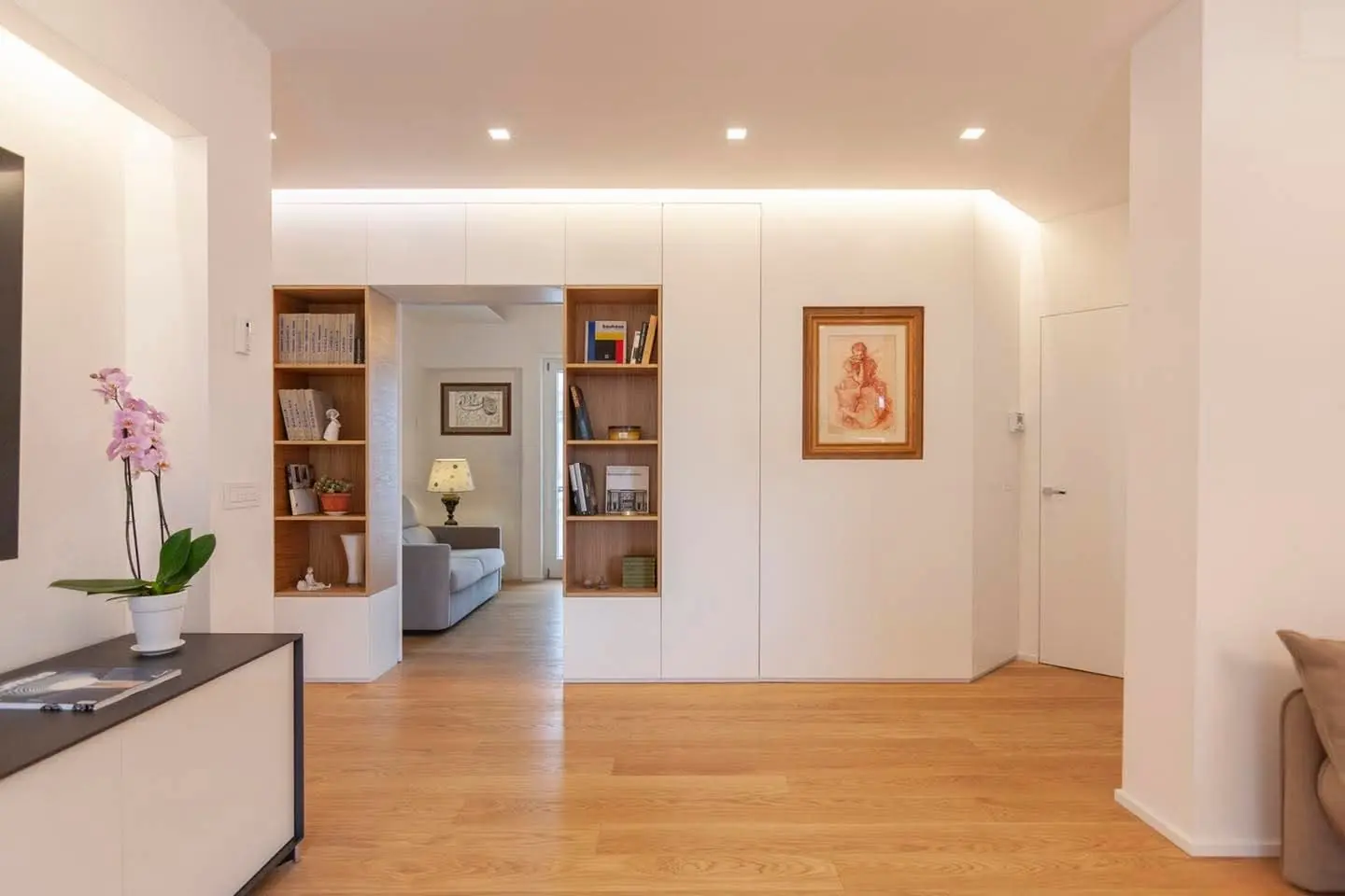 Living open space con libreria su misura, Roma Montesacro